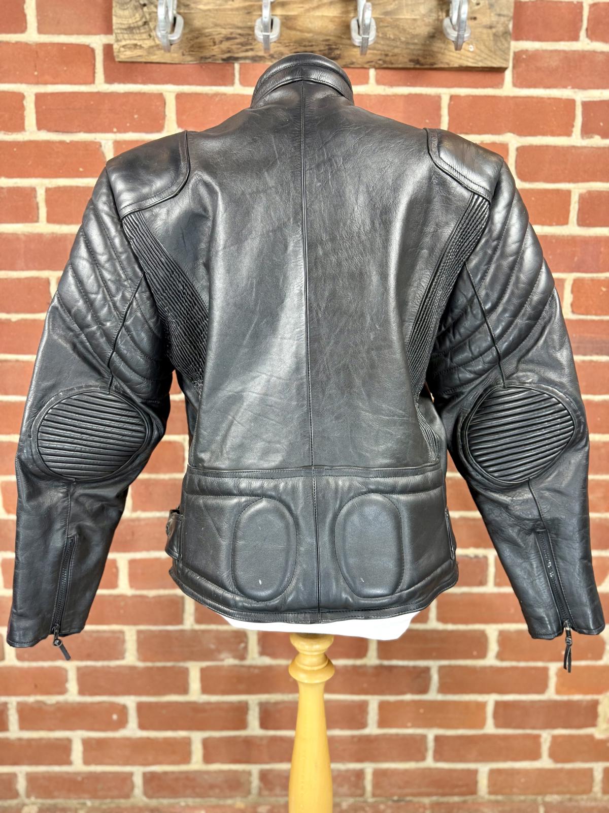 Vintage Black Leather Motorcycle Jacket with Protective Padding Circa 90s/Y2K